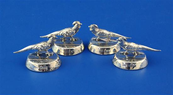 A set of four George V novelty silver menu holders by Sampson Mordan & Co, height 1in.